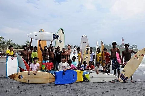 The Kovalam Surf Club offers free schooling and surfing lessons to underprivileged children