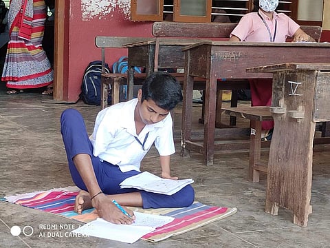 Kaushik Acharya write his exams using feet