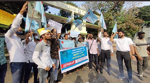 PFI protest against the professor (Picture: Twitter)