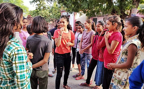 Empowerette team communicating with young girls (Pictures: Aditi Gera)