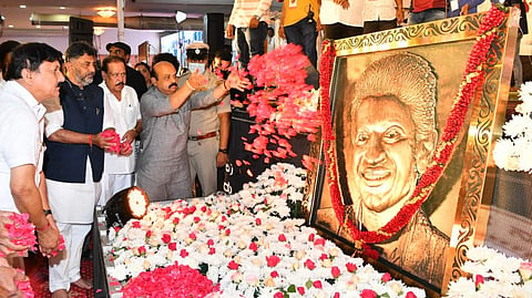 Chief Minister Basavaraj Bommai pay floral tributeto portrait of Puneeth Rajkumar | Pic: Express