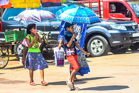 Students walking in the heat image for representational photo only | (Pic: Express)