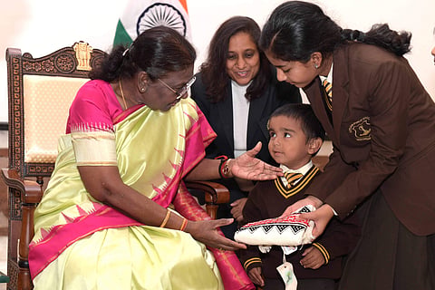 Children from various schools and organisations met President Droupadi Murmu at Rashtrapati Bhavan on the occasion of Children's Day. (Pic: @rashtrapatibhvn)