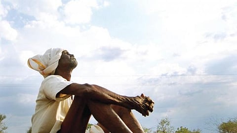 farmer waiting for rain