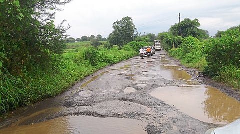 citizens suffer due to large number of potholes on taked-dhamangaon road