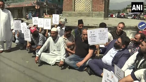 government employees Protest against the murder of a bank manager