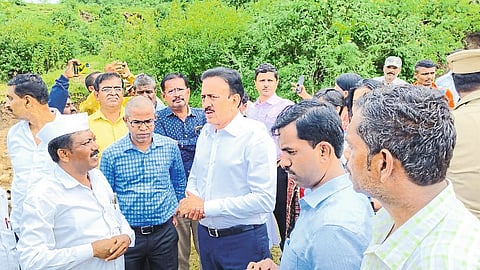 Rural Development Minister Girish Mahajan during the actual inspection of dams burst due to cloudburst and damage to farmers.