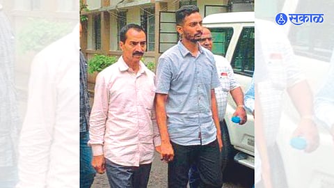 Suspects detained by police.