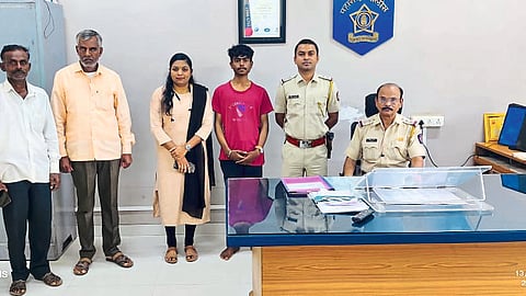 Police Inspector Dilip Landge and others while handing over the missing child to the family.