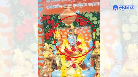 Snake sitting on the statue of Mahadev Shankara in the temple here.