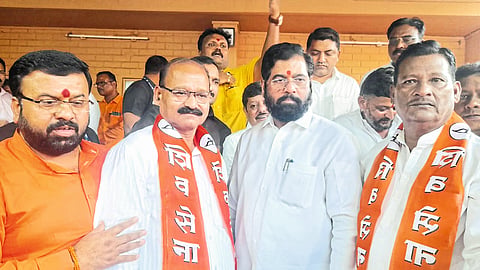 Vasant Patil and colleagues entering the party in the presence of Chief Minister Eknath Shinde.