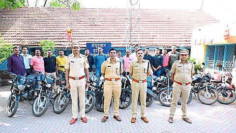 District Superintendent of Police along with the motorcycles seized by Nandurbar City Police. R. Patil.