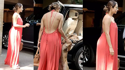 Malaika Arora gets trolled for her walking style as she gets papped wearing a red strappy jumpsuit