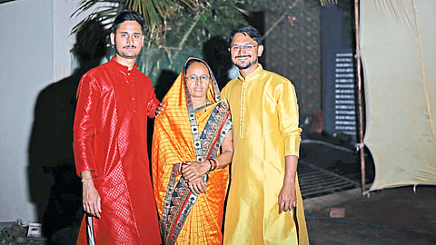 Dheeraj Jadhav with mother Manisha, elder brother Chandrakant