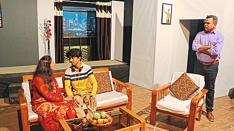 Actors of Deepak Mandal presenting scenes from the play 'Balance Sheet' in the State Drama Competition.