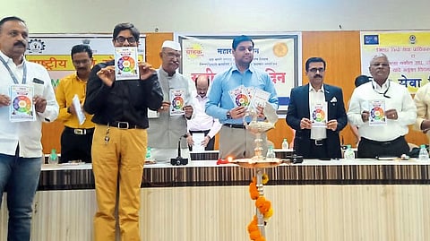 Jalgaon: Collector Aman Mittal, District Supply Officer Sunil Suryavanshi etc. during the release of consumer awareness booklet at district level National Consumer Day program on Saturday
