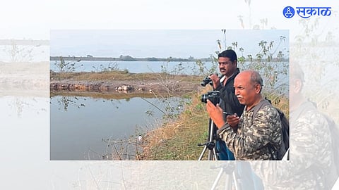 Lamkani: While observing birds in the lake area, Dr. Bhagwat and colleagues.