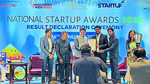 Founder Jayesh Tope and colleagues accepting the National Award for Startup Revamp Motto in Nashik at a function organized by the Union Ministry of Commerce on the occasion of National Startup Day on Monday.