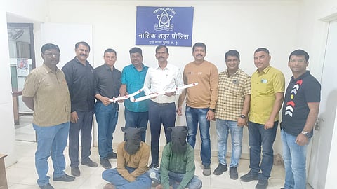 A team of the city crime branch's unit one with the duo flashing deadly weapons on Instagram.