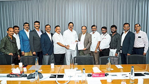 Company management officials and Dutta Samant Praneet Association of Engineering Workers officials on salary increment agreement in ABB India Limited Company.