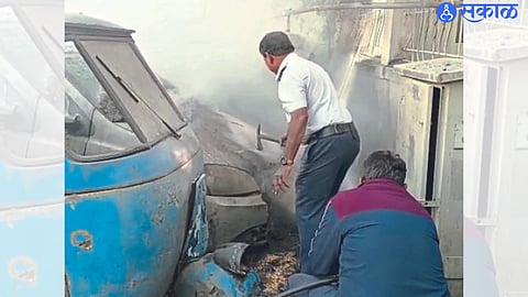 Fire department personnel controlling the fire