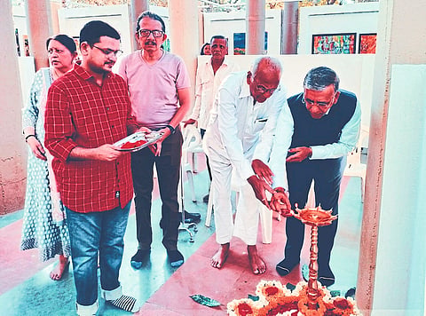 Ashok Jain inaugurating the picture exhibition of Shivam Hujurbazar. Respected neighbors.