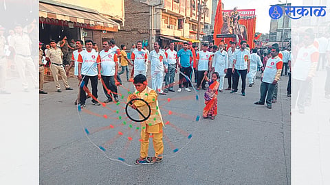 Children performing manly games in Shiv Jayanti procession as well as the 15 feet equestrian statue of Chhatrapati Shivaji Maharaj which became the attraction of the procession.