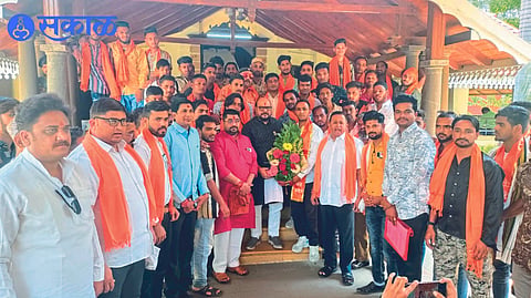 Guardian Minister Gulabrao Patil and others welcoming Muslim youths when they join Shiv Sena.