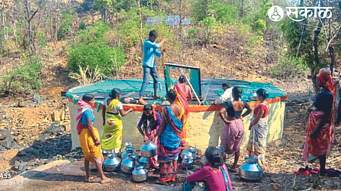 Women fetching water from the well here