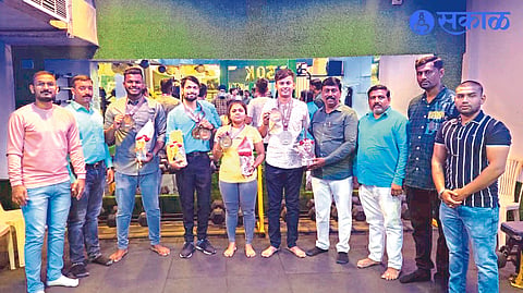 Dignitaries felicitating athletes of Unique Fitness Club who won medals in National Power Lifting Competition.