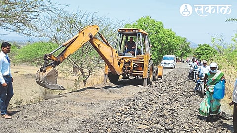 Ongoing repair of ghat at Mhaiswalan
