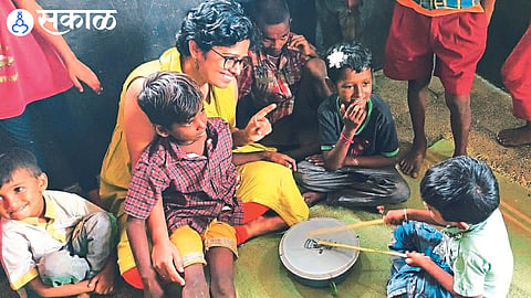 Colleagues of Vardhishnu Sanstha's 'Anandghar' project engaged in teaching life skills to underprivileged children.
