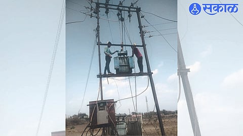 Mahavitaran employees changing the transformer at Nimon.
