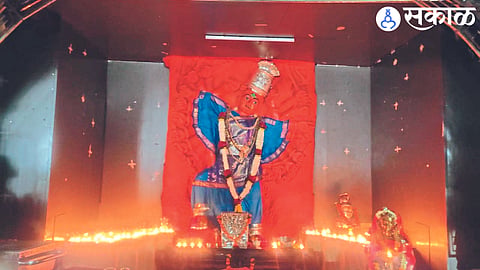 After switching off the lights in the temple hall on the occasion of Deep Amavasya, the resplendent idol of Adimaya in the bright light of the lamps.