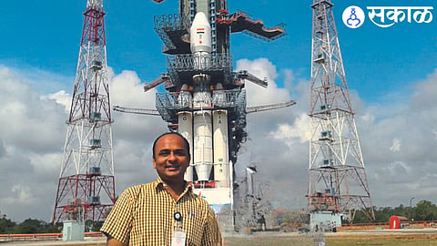Sanjay Desarada with the spacecraft ready for the launched Chandrayaan-3 mission.