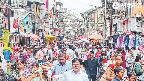 The market was overflowing with citizens out shopping