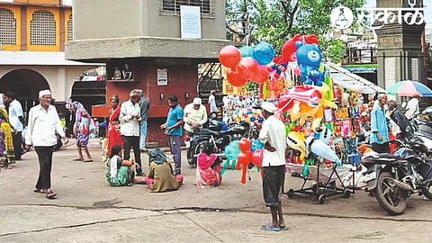 Beggars waiting for devotees who bring food to Ramtirth.