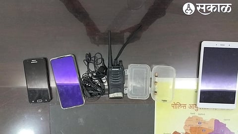 walkie talkie, headphones, tab, two mobile phones seized