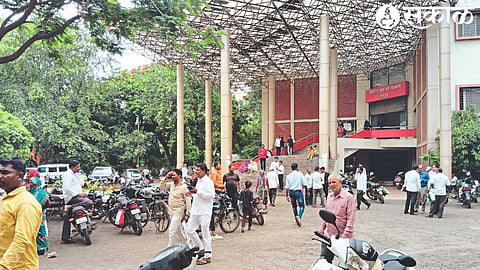Vehicles parked haphazardly in the court area of Malegaon city.