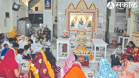 Jain community members and women devotees participating in the Mahavir Swami Nirvana festival organized by the Digambar Jain Samaj here.