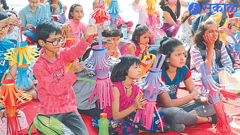 Students participating in making lanterns in a workshop.
