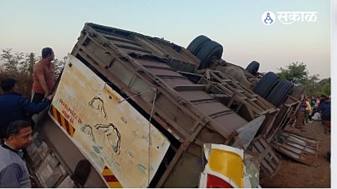 Two people died and 55 got injured after a travel bus overturned in the Tamhani Ghat area of Raigad
