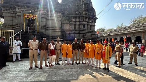 Police Commissioner Sandeep Karnik, Deputy Commissioner Kiran Kumar Chavan, Assistant Commissioner Nitin Jadhav and trustees of the temple at Shri Kalaram temple.