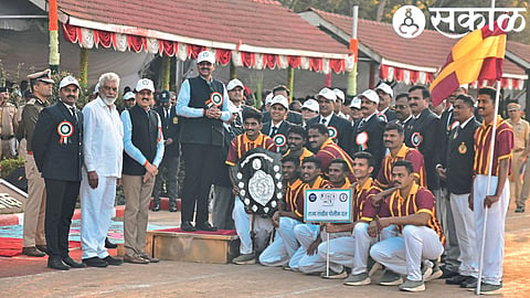 Deputy Chief Minister Devendra Fadnavis, Guardian Minister Dada Bhuse, Rural Development Minister Girish Mahajan along with the team of the State Reserve Police Force who won the overall title in the ongoing state level police sports competition here.
