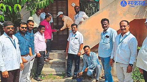 Municipal team while taking action on tax collection issue.