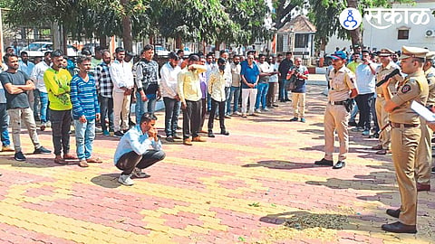 Kishore Kale taking a parade of 67 history sheeters at the Superintendent of Police office