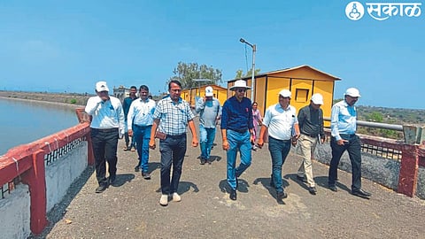 Officials with District Magistrate Jalaj Sharma during an inspection of Palkhed Dam, Left Canal on Wednesday.