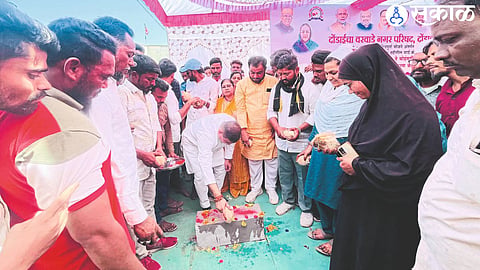Jayakumar Raval performing Bhoomi Pooja for road work.