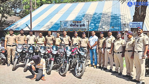 Police inspector K. K. Patil and colleagues along with seized bikes of suspect.