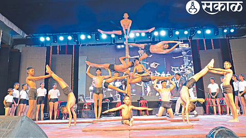 Athletes doing yoga demonstrations and Mallakhamb exercises on Saturday at the Mahasanskrit Mahotsav.